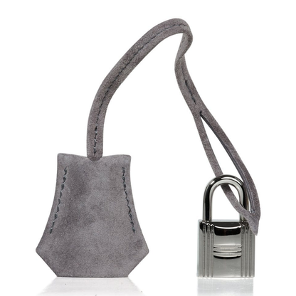 Soft Mist Ash Grey Smooth Matte Fuzzy Grain Compact Rigid Hand Tote With Mirror-Silver Twist Lock Hardware And Coordinating Grey Suspended Metal Padlock Charm