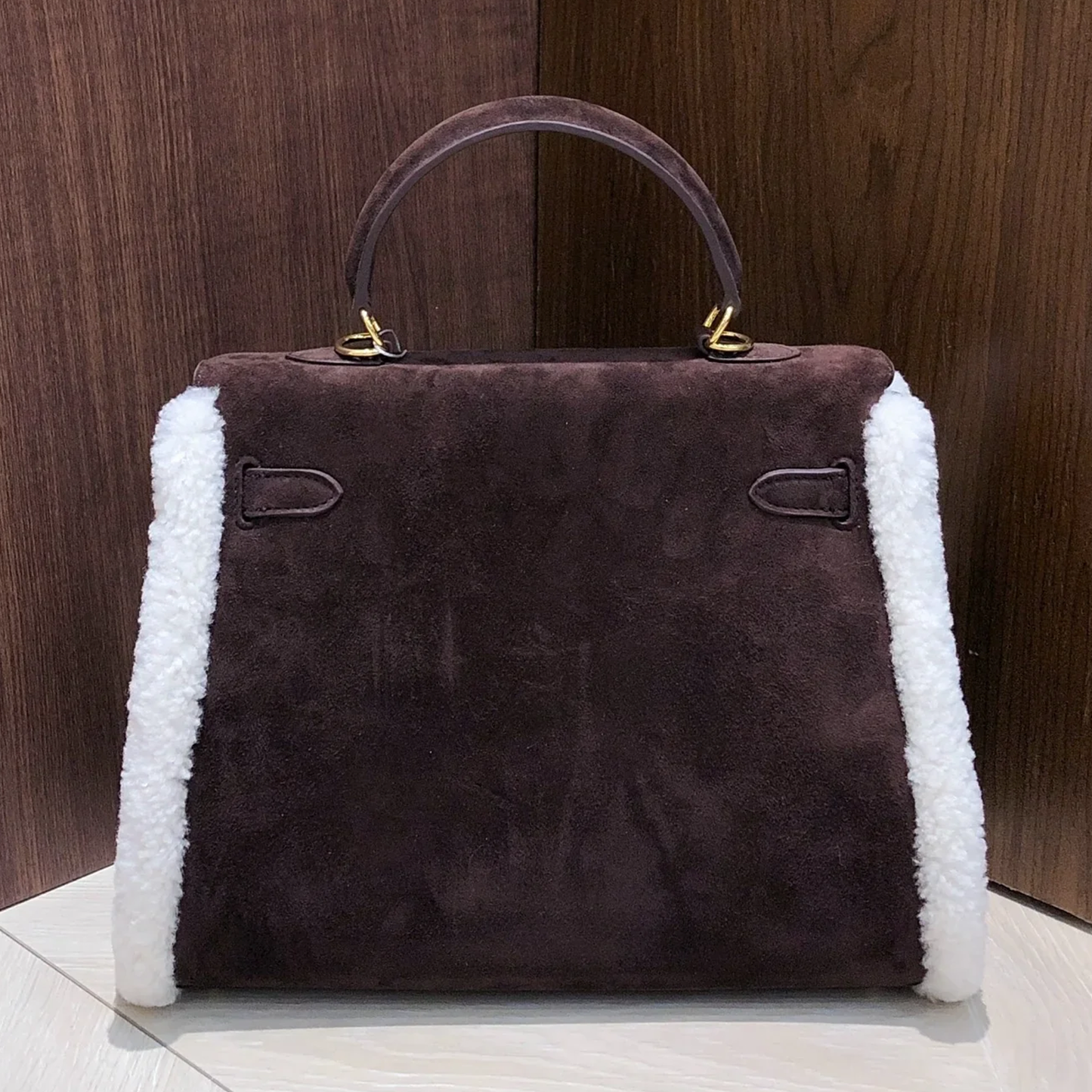 Deep Espresso Velvety Compact Trapezoid Hand Tote With Creamy White Curly Side Trim And Luminous Golden Twist Lock Hardware Fixtures